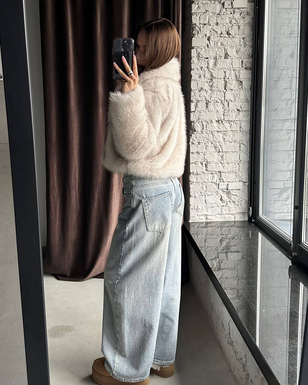 Women's cream cropped jacket with a textured finish and long sleeves