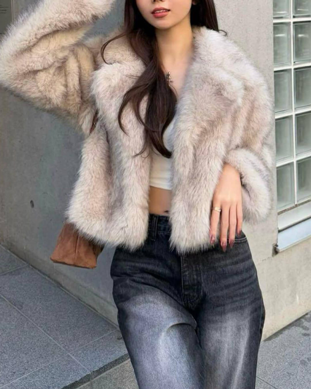Women's cream cropped jacket with a textured finish and long sleeves