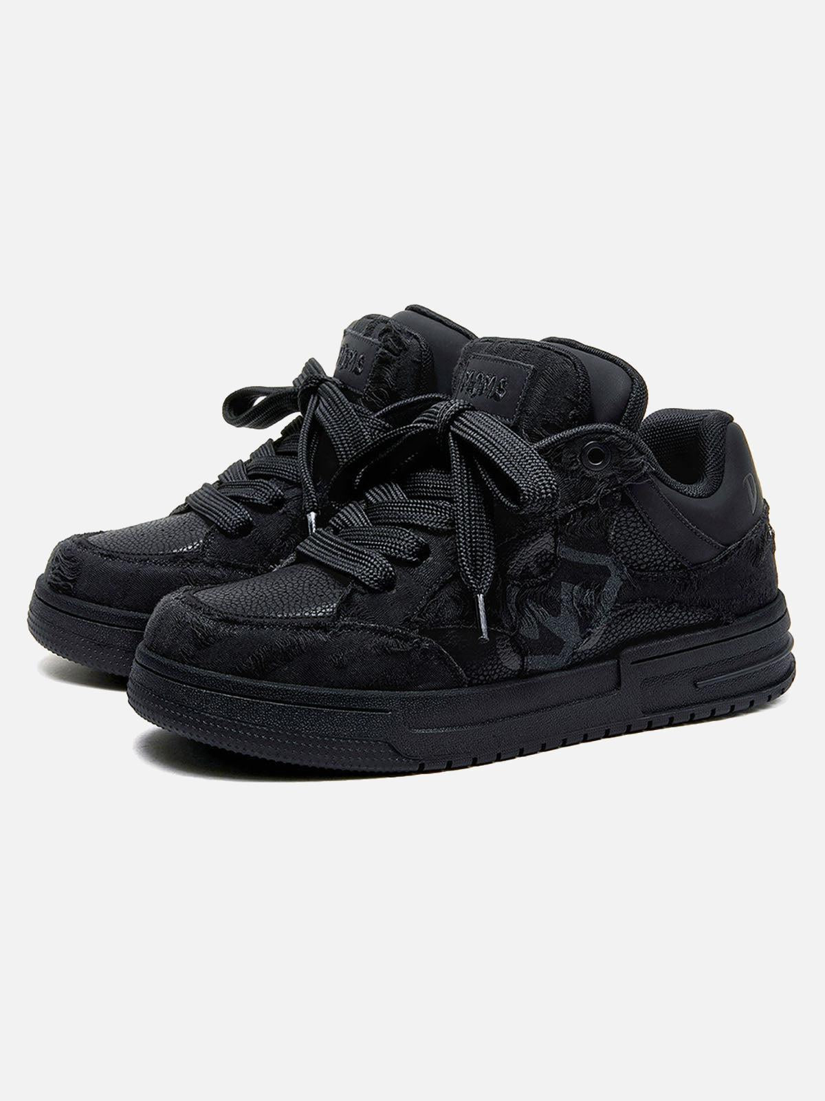 Black high-top skate trainers with lace-up fronts and camouflage side detailing