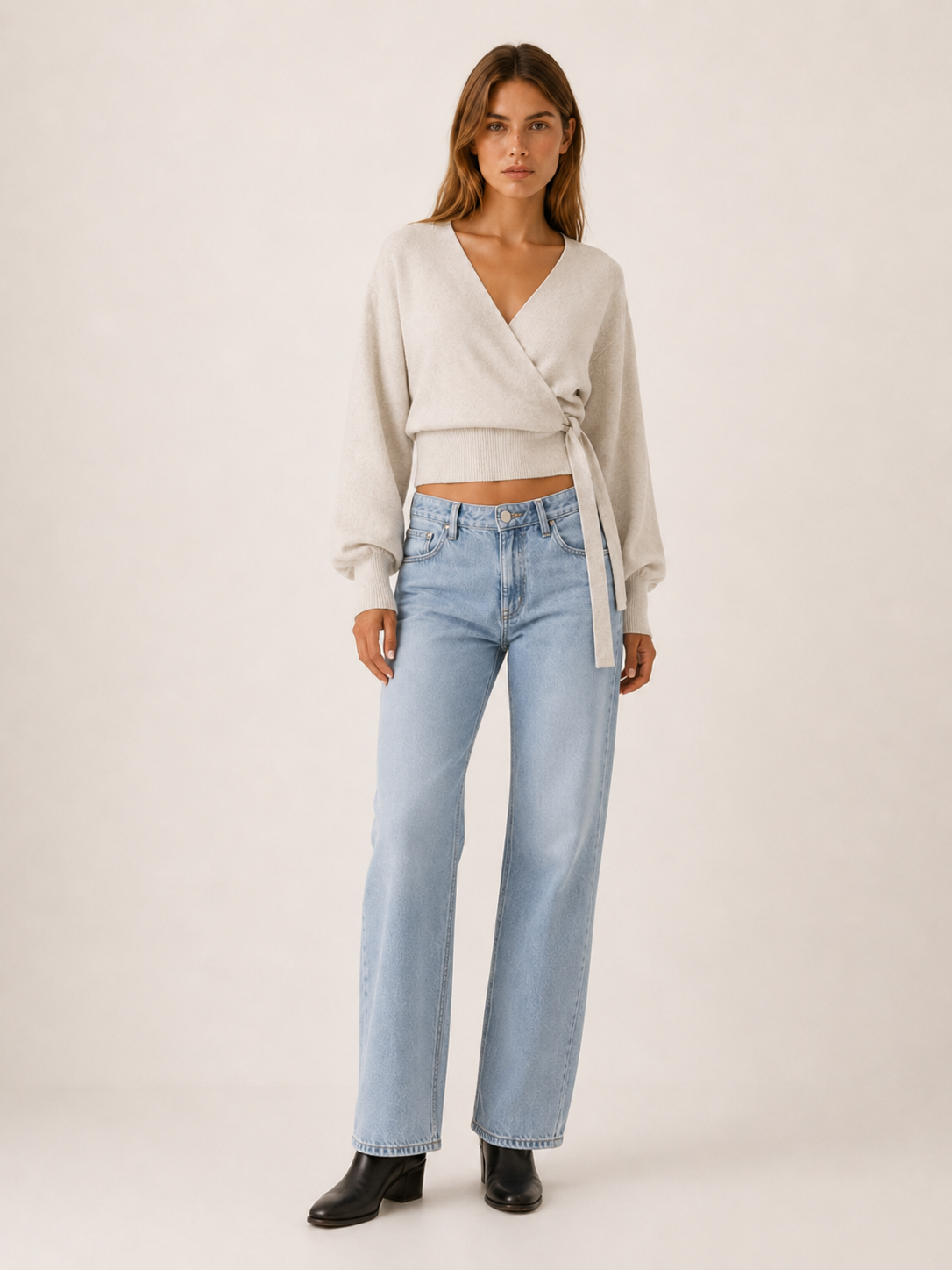 Women's wrap knit jumper with V-neckline, long sleeves and waist tie