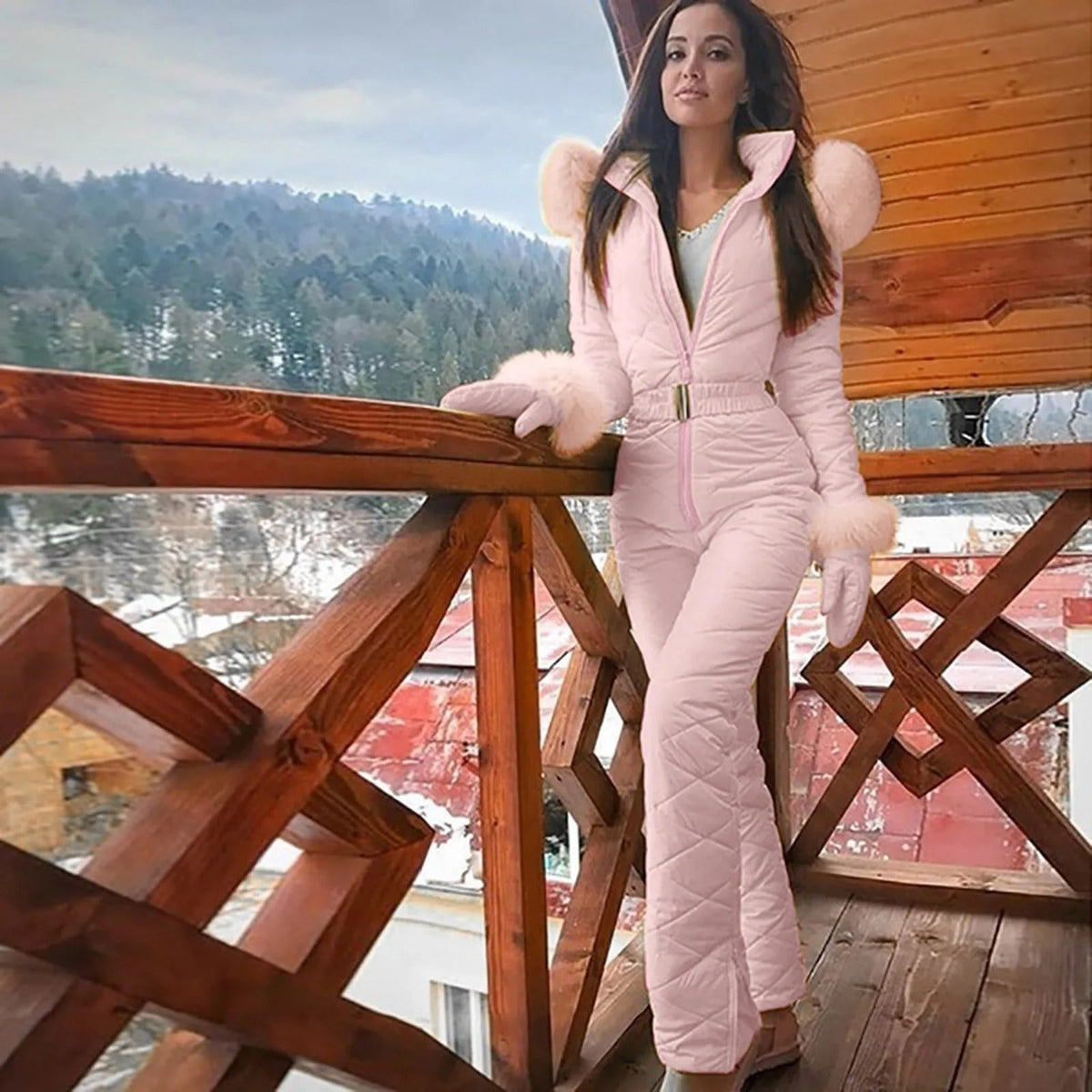 Women's quilted ski jumpsuit with high collar, belt and long sleeves