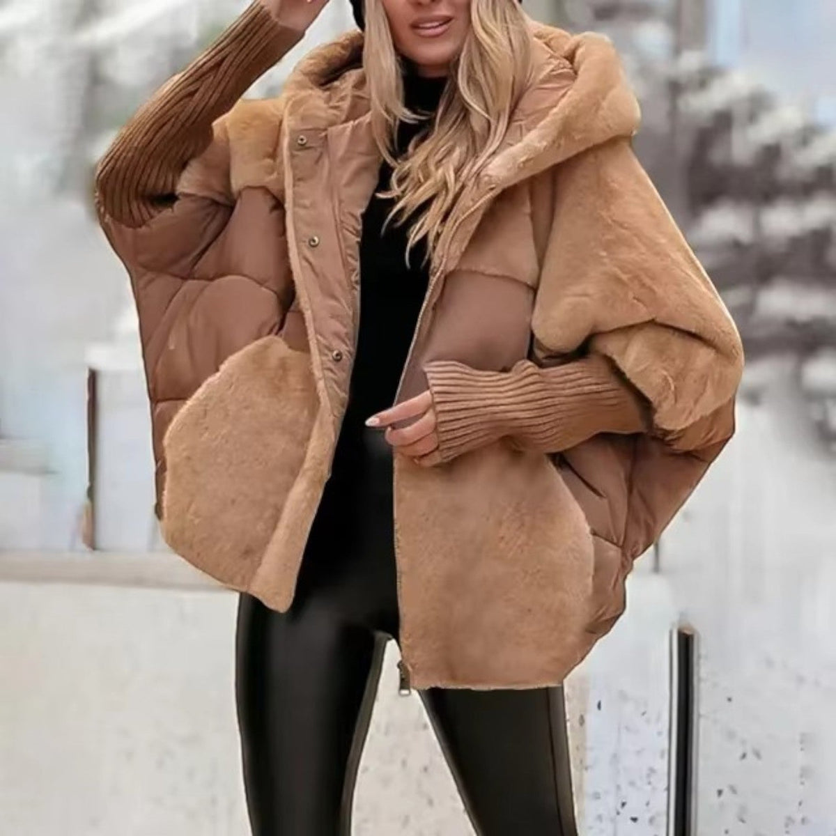 Women's oversized padded hooded jacket with ribbed cuffs and zip front