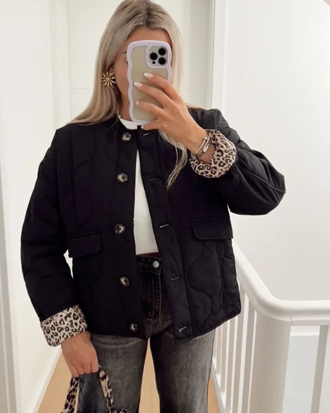 Women's quilted jacket with leopard print cuffs, button front and flap pockets