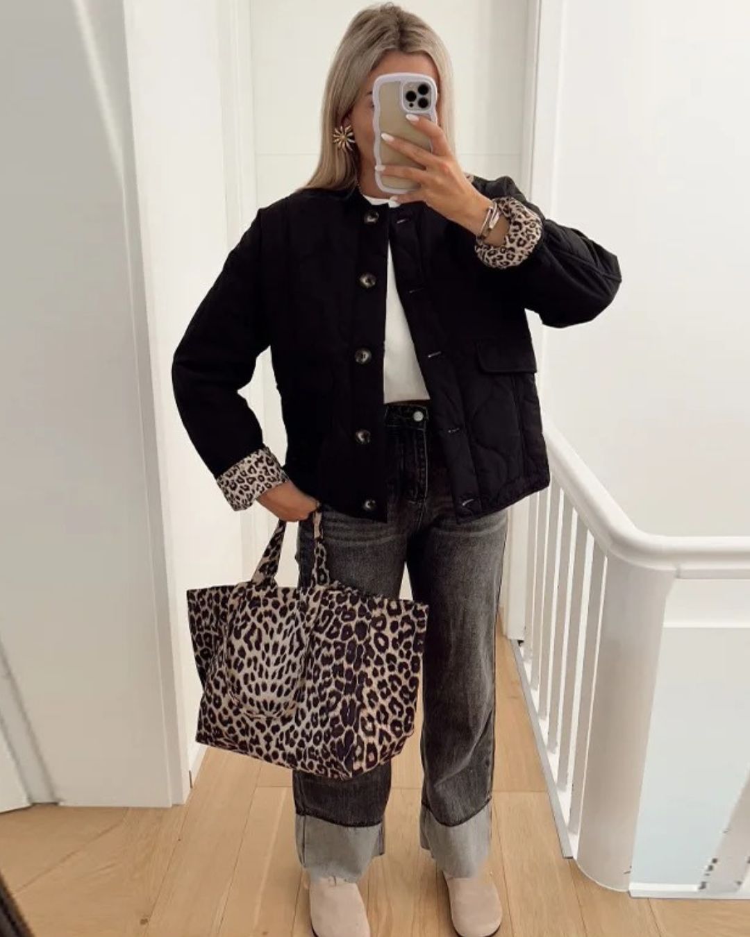 Women's quilted jacket with leopard print cuffs, button front and flap pockets