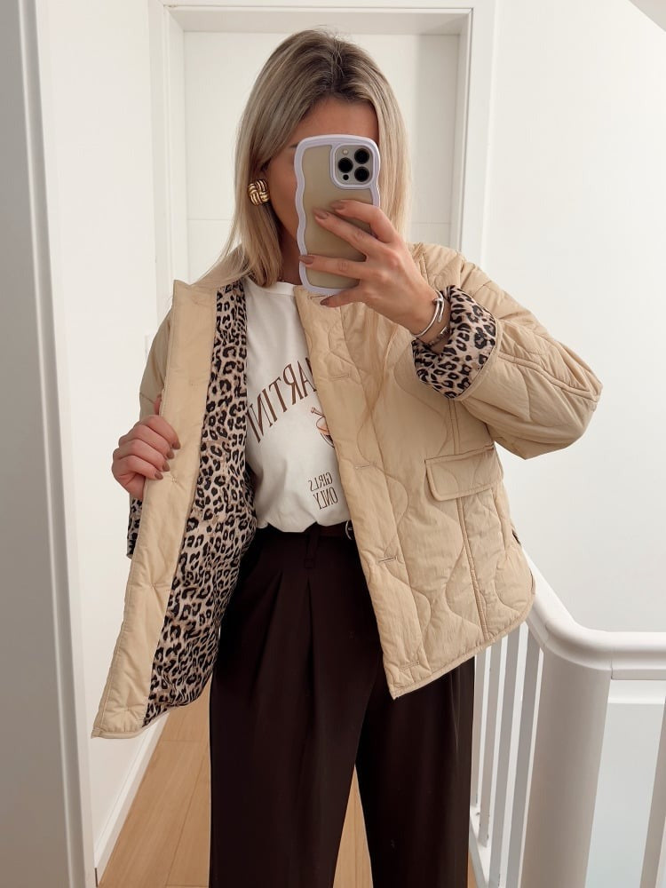 Women's quilted jacket with leopard print cuffs, button front and flap pockets