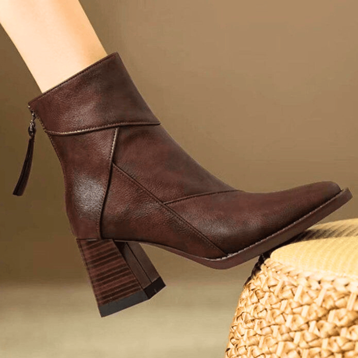 Women's pointed toe ankle boots with high flared block heels and stitched panel details