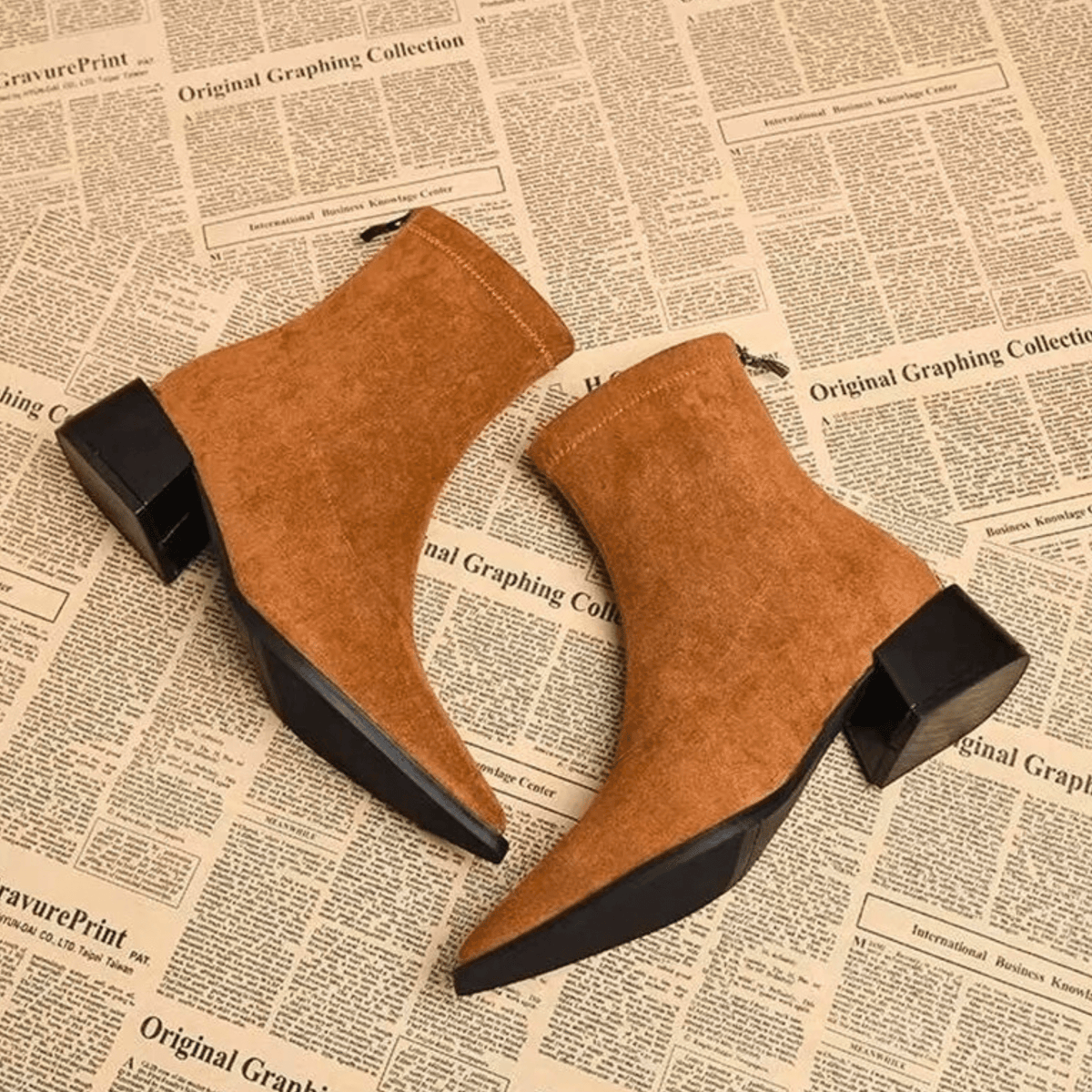 Women's pointed-toe ankle boots with leopard print uppers and block heels