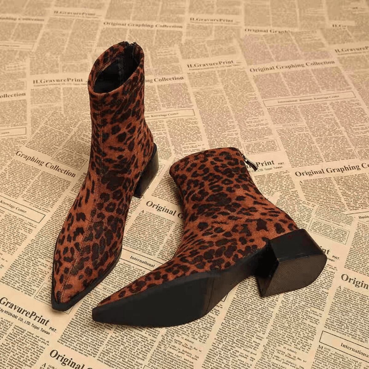 Women's pointed-toe ankle boots with leopard print uppers and block heels