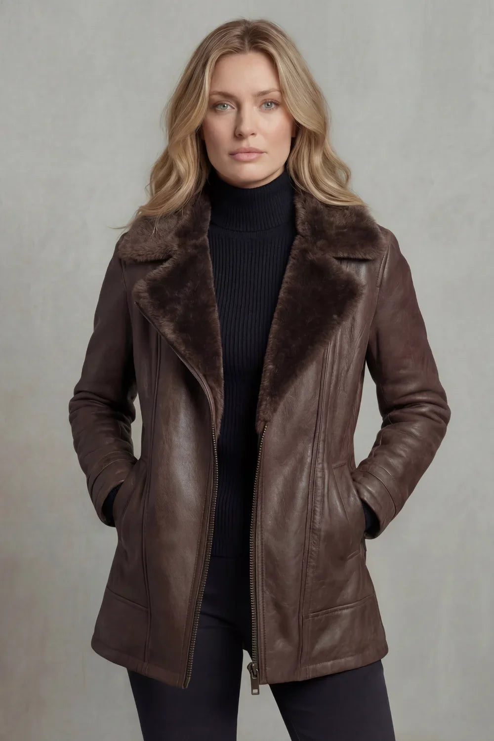 Women's brown jacket with a wide fur-trimmed collar and front zip fastening