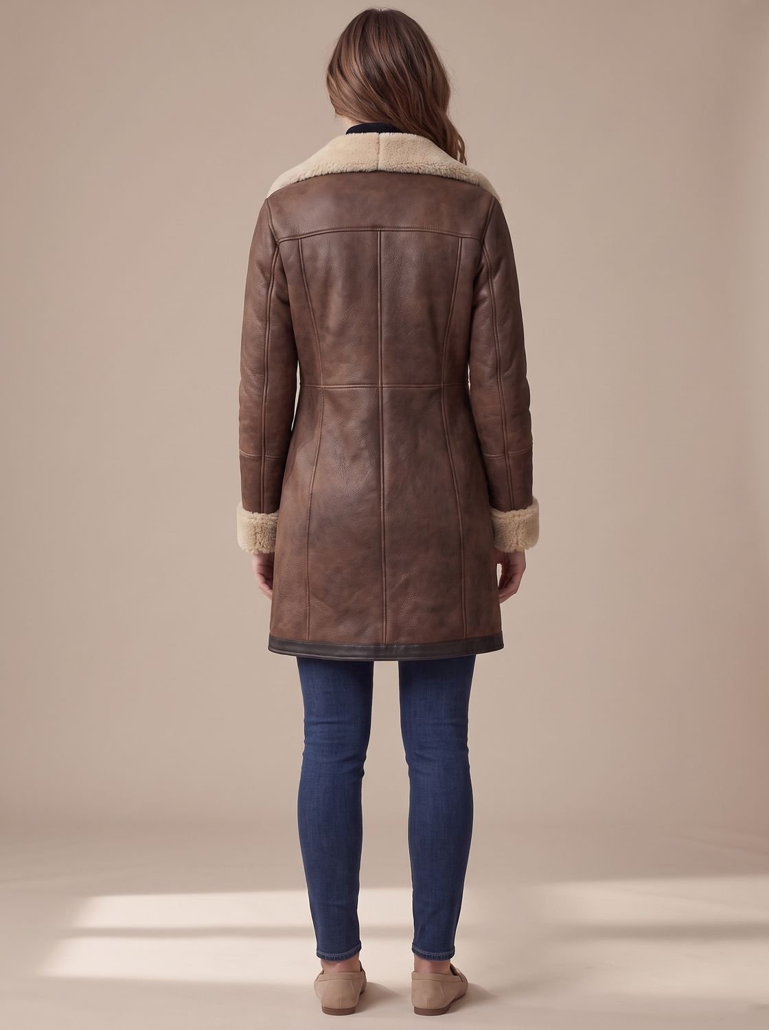 Women's long coat with contrasting shearling-style collar and cuffs