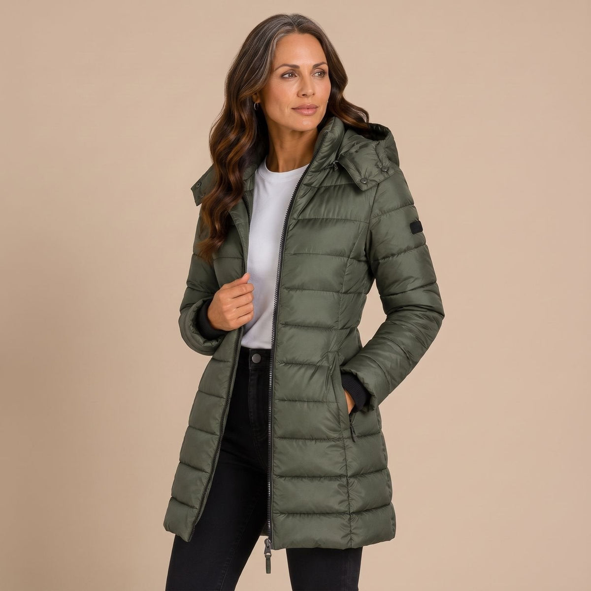 Women's hooded quilted puffer jacket with long sleeves and zip front