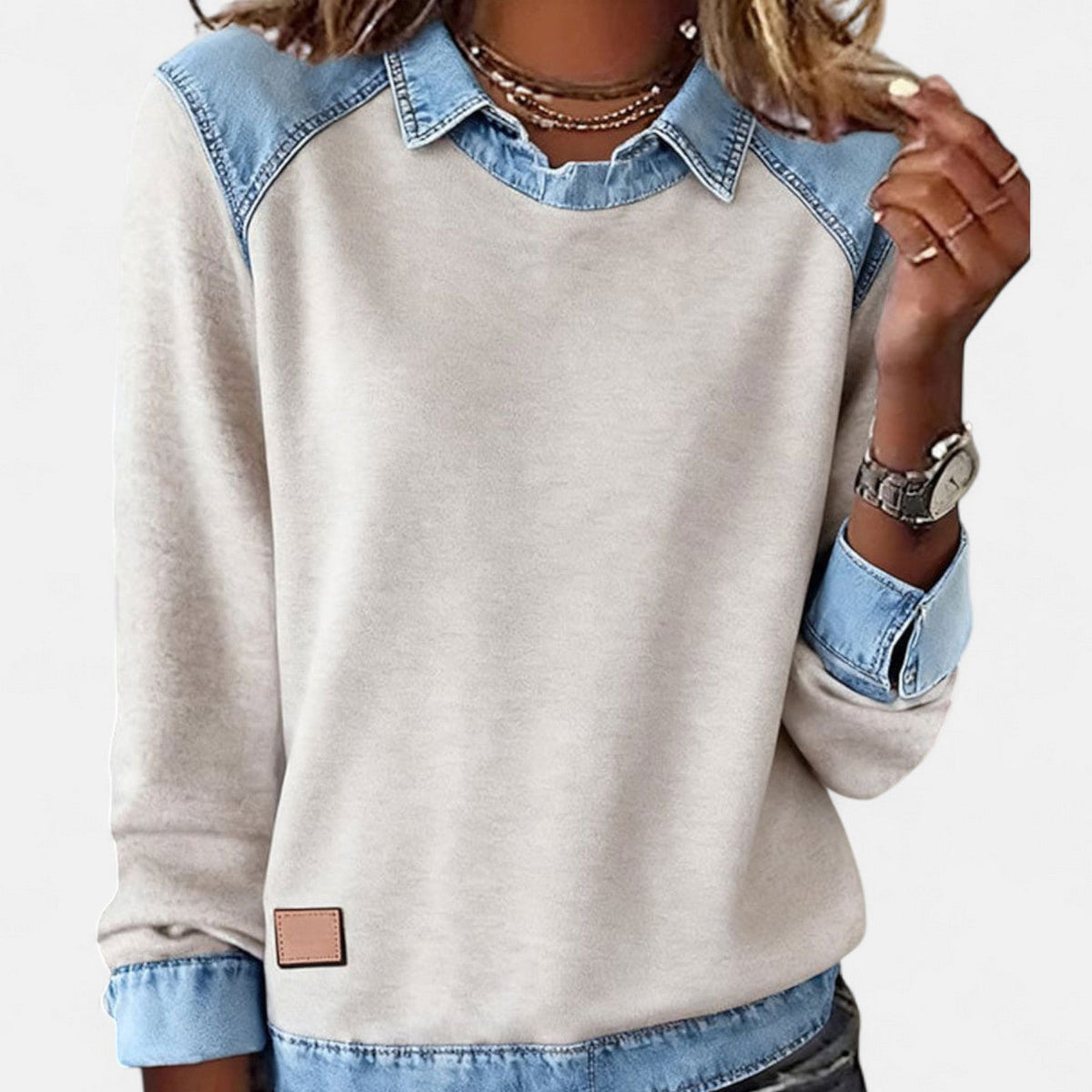Women's long-sleeved collared sweatshirt with contrasting denim-style patchwork panels
