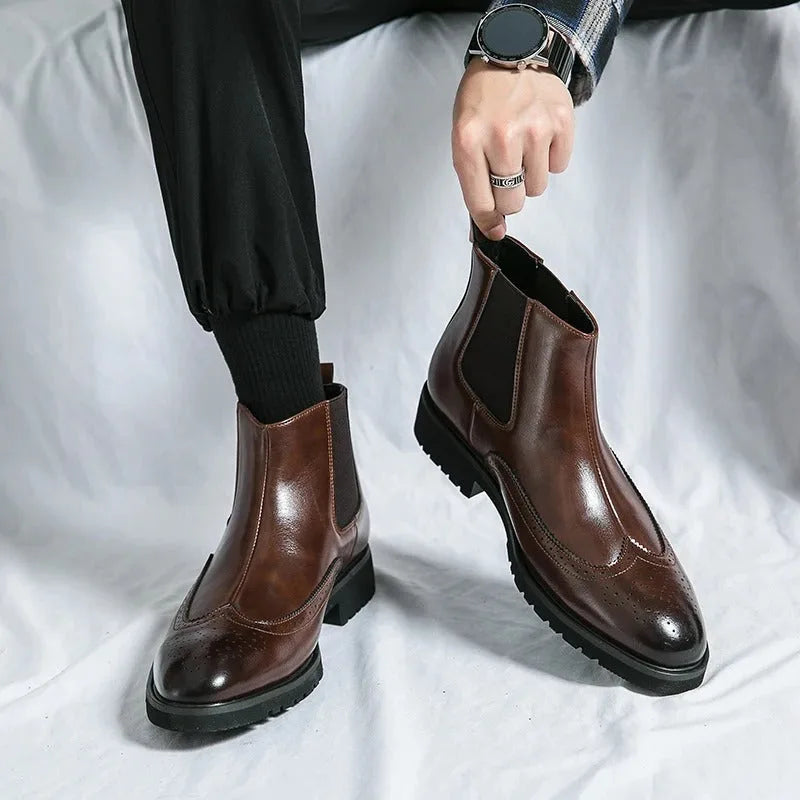 Chelsea boots with brogue detailing, elastic side panels and lug soles