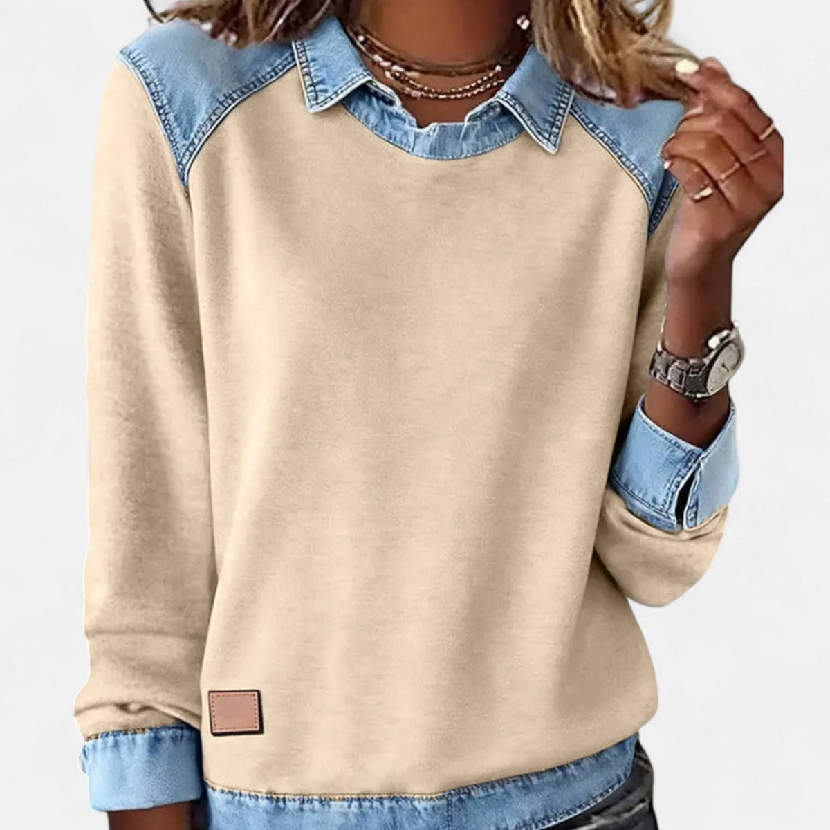 Women's long-sleeved collared sweatshirt with contrasting denim-style patchwork panels