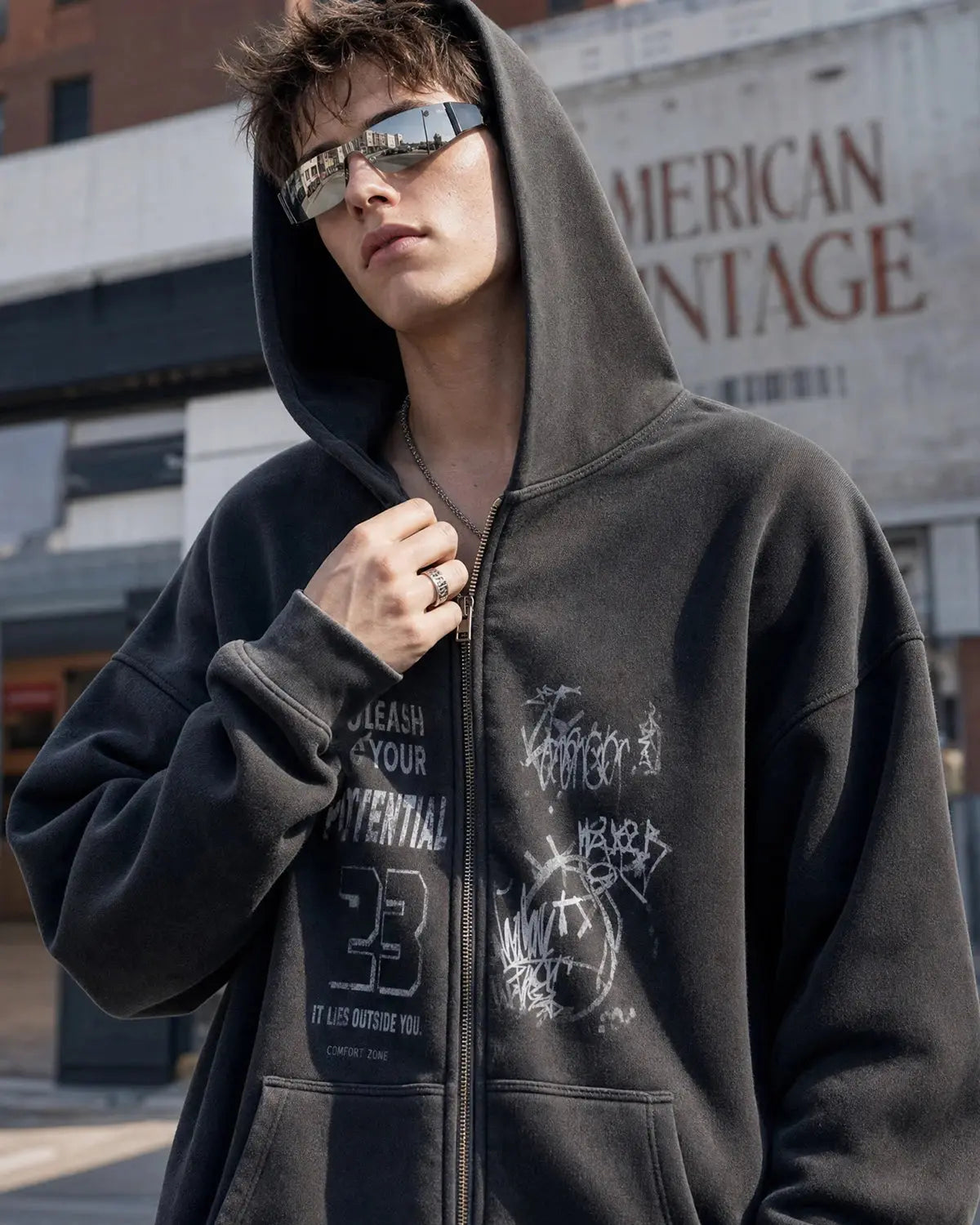 Unisex washed zip-up hoodie with hood and front graphic print