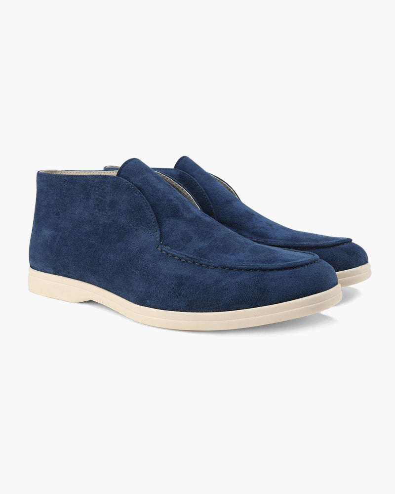 Ankle-height slip-on loafers with round toes and flat soles