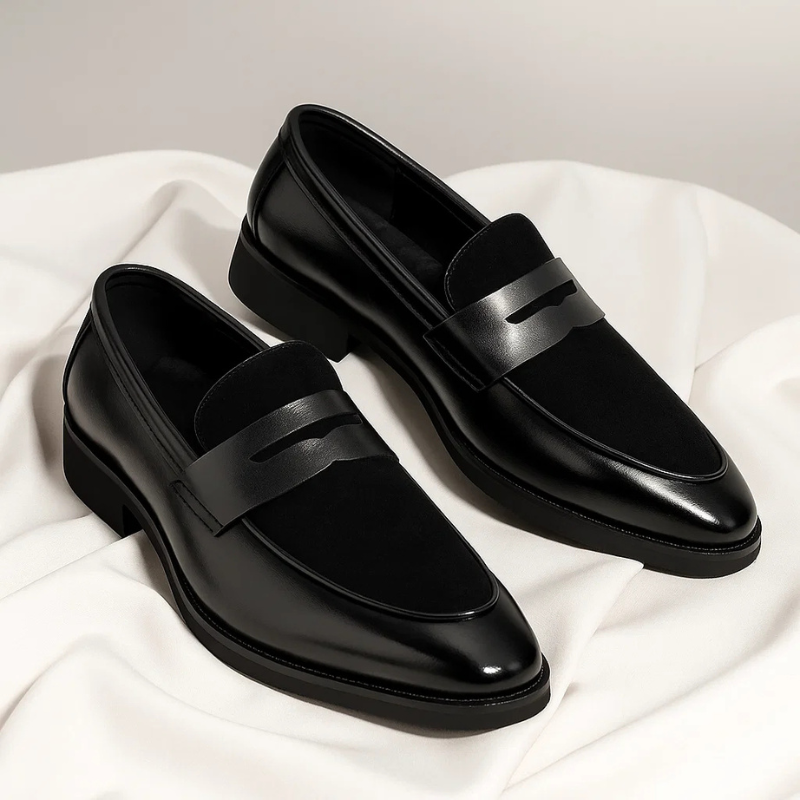 Men's penny loafer with almond toe, low heel and vamp strap