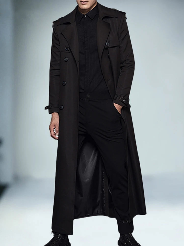 Men's black extra-long double-breasted trench coat with notched lapels and flap pockets
