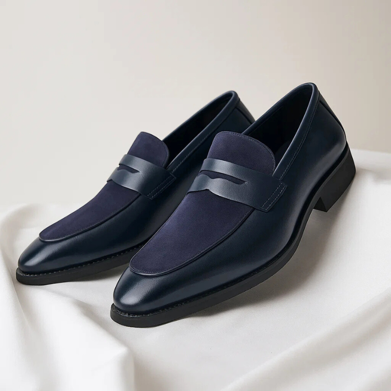 Men's penny loafer with almond toe, low heel and vamp strap