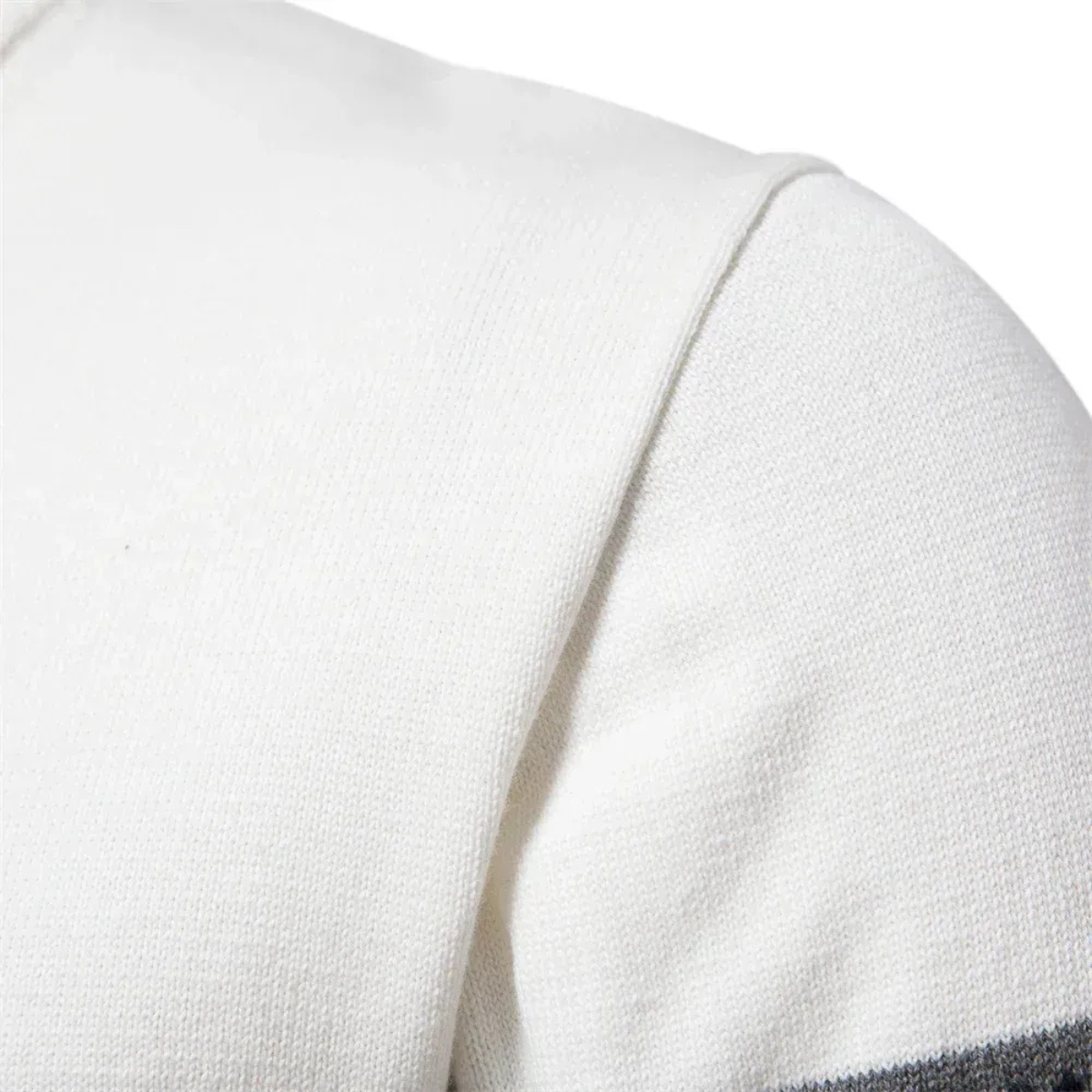 Men's quarter zip mock neck sweater with Fair Isle geometric bands and textured knit lower body