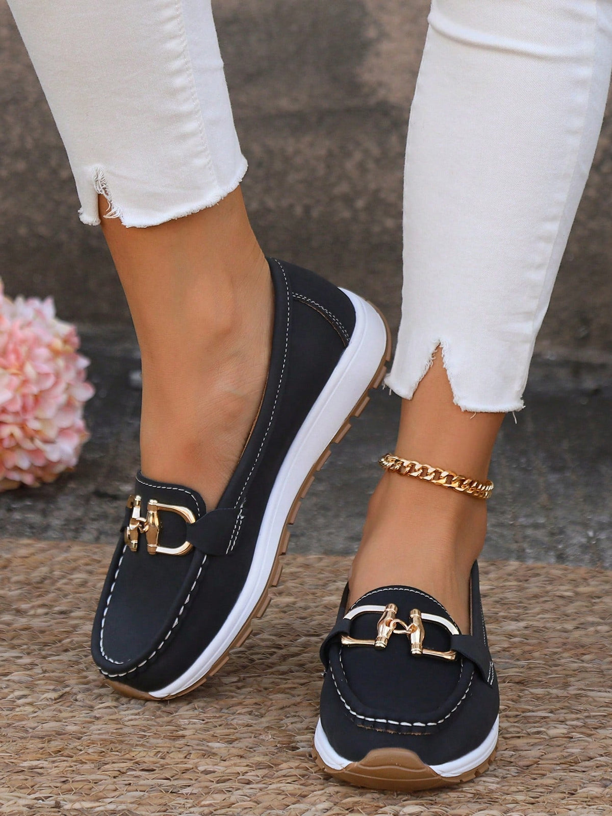 Women's flat loafers with moc stitching and gold-tone buckle trim