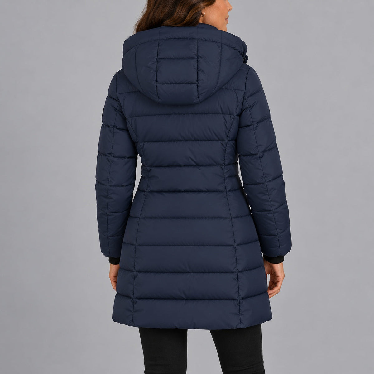 Women's long quilted hooded puffer coat with zip front and zipped pockets