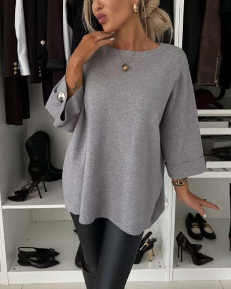 Women's plain round neck jumper with long sleeves and button cuffs