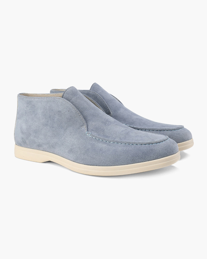 Ankle-height slip-on loafers with round toes and flat soles