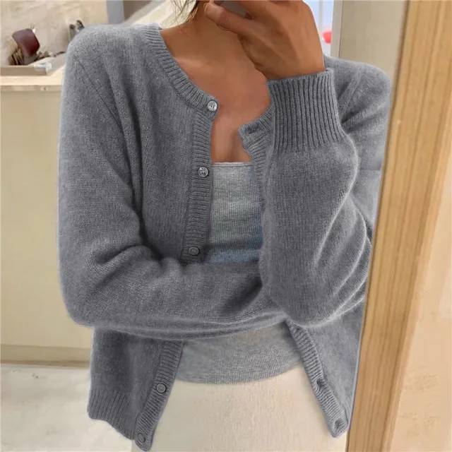 Women's relaxed button front knit cardigan with long sleeves and ribbed trims