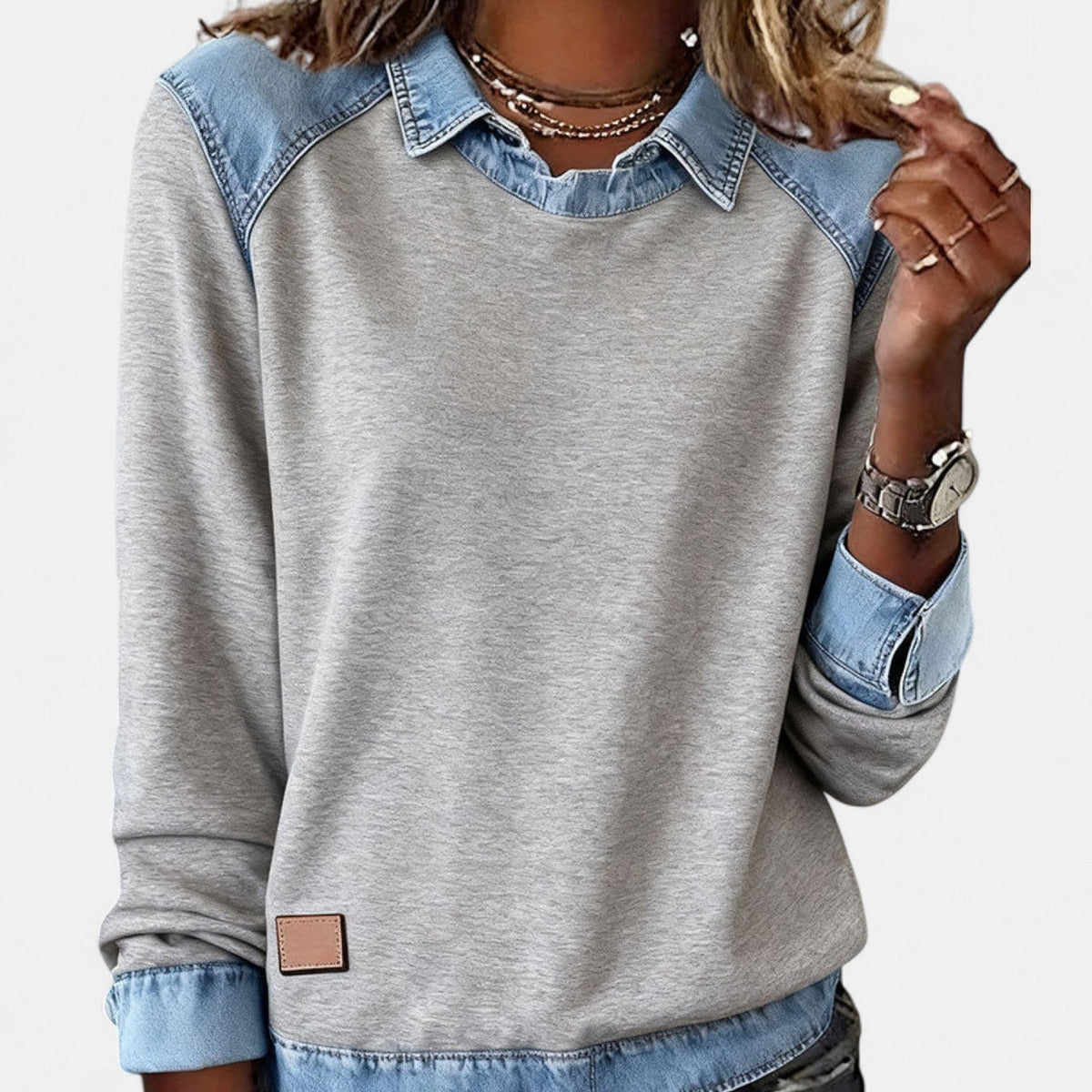 Women's long-sleeved collared sweatshirt with contrasting denim-style patchwork panels