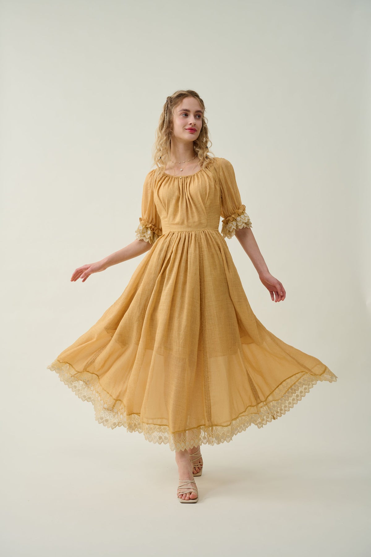 Women's floral maxi dress with puff sleeves and lace trim