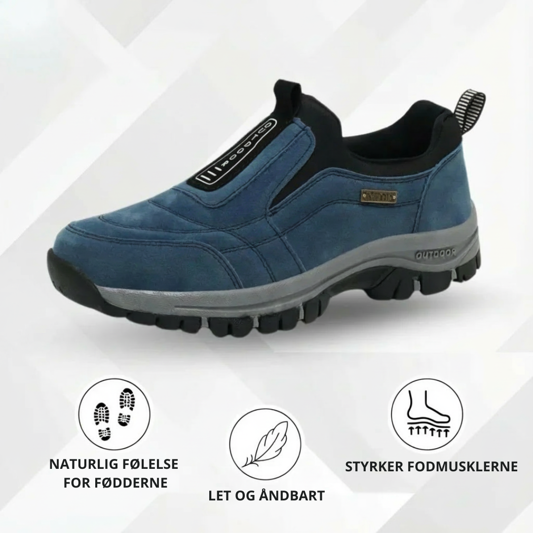 Slip-on walking shoe with stitched panels, contrast sole and deep tread