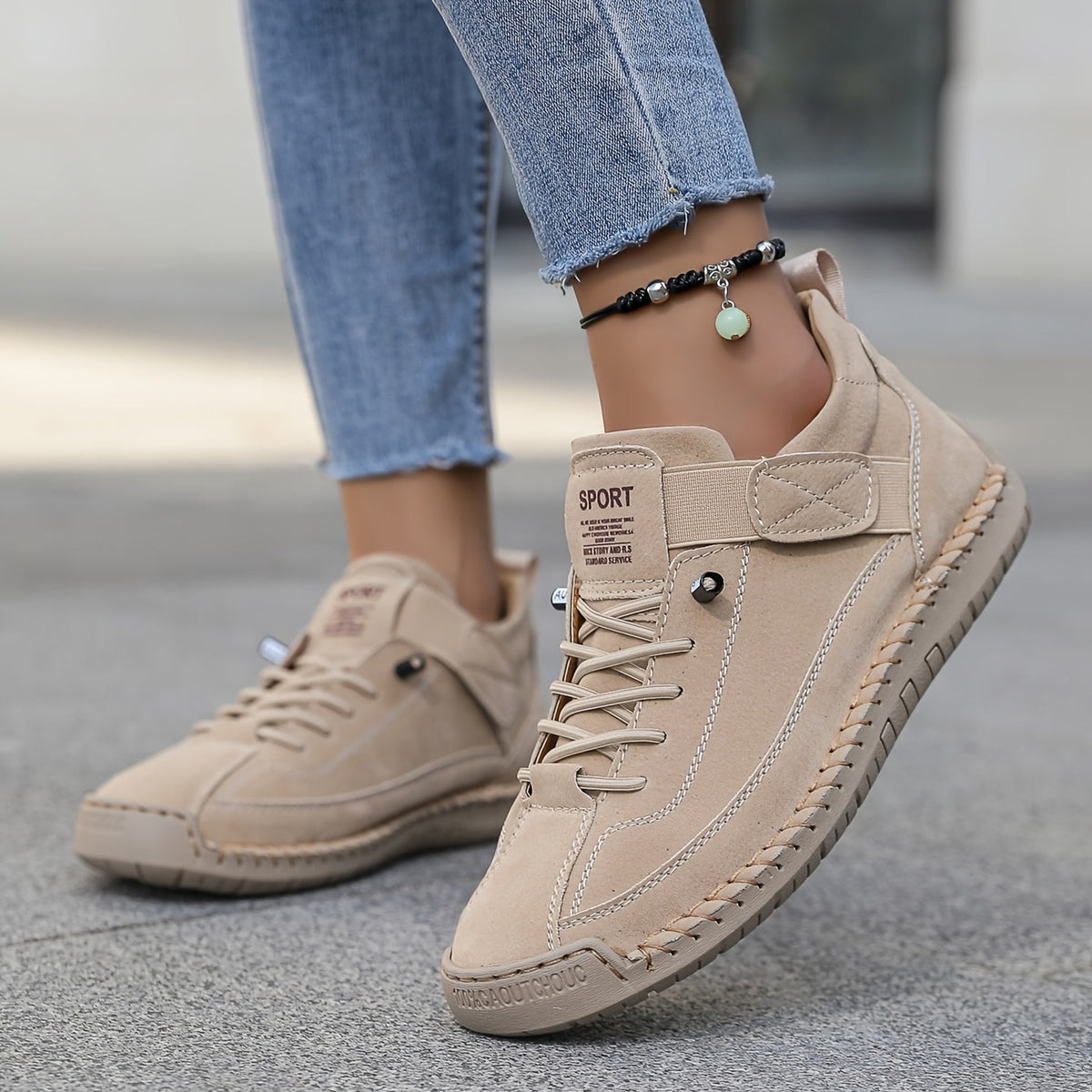 Women's lace-up high-top trainers with ankle strap and stitched panels