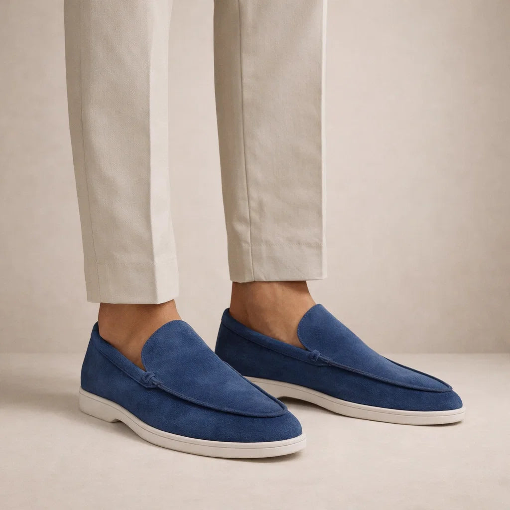 Men's slip-on moc toe loafers with stitched detail and flat light soles