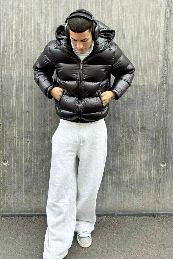 Men's hooded quilted puffer jacket with front zip and angled pockets