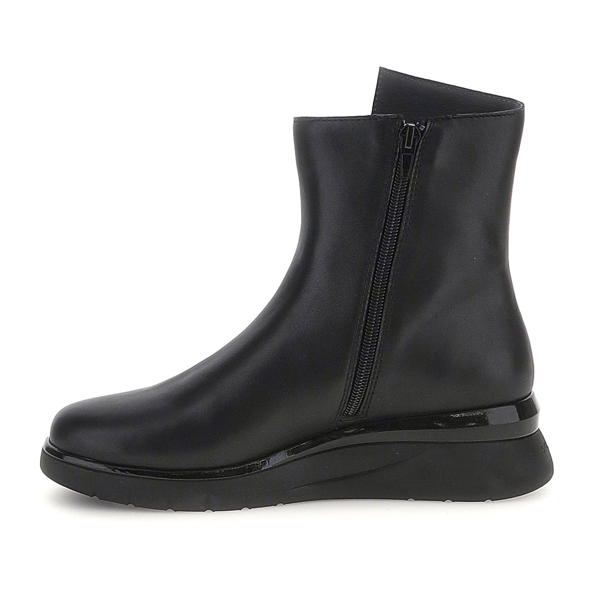 Black ankle boots with dual side zips and chunky platform soles