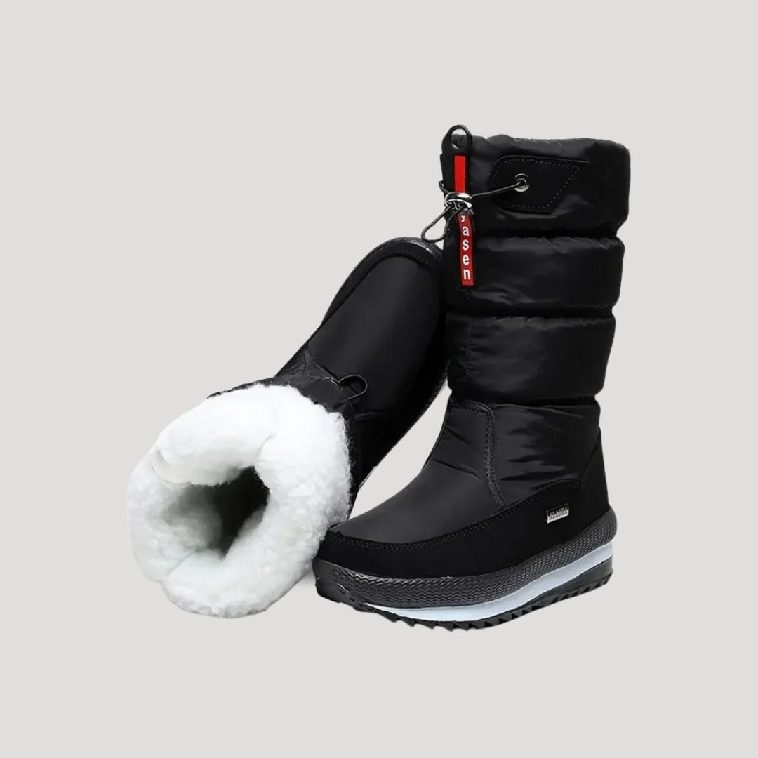 Women's quilted mid-calf winter boots with side zips and lugged soles