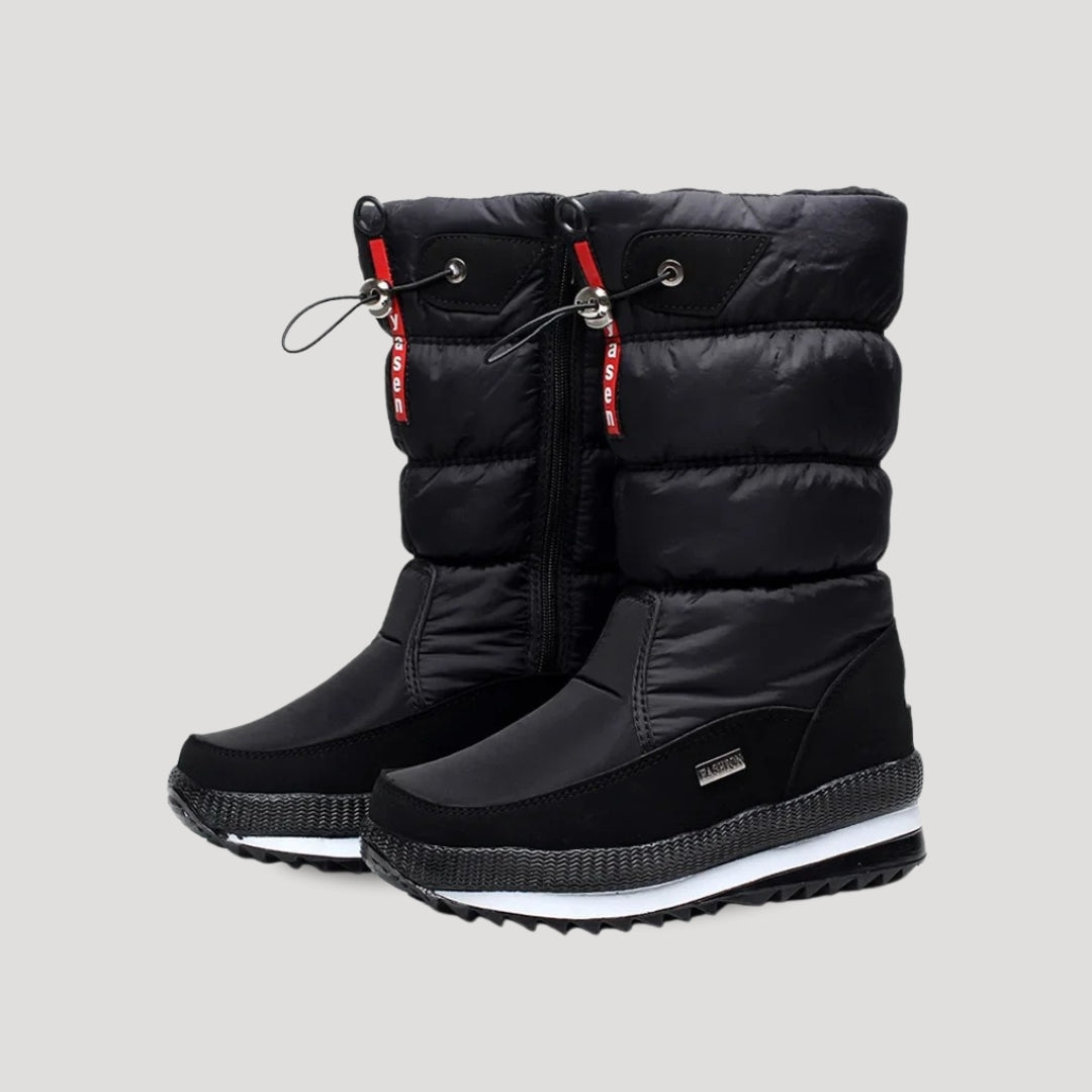 Women's quilted mid-calf winter boots with side zips and lugged soles
