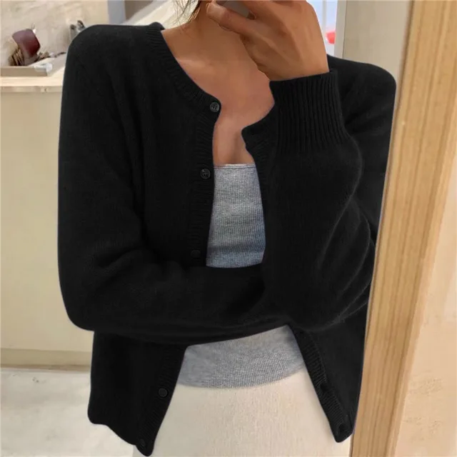 Women's relaxed button front knit cardigan with long sleeves and ribbed trims