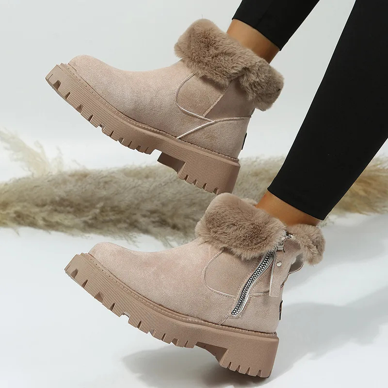 Women's ankle boots with plush fur cuffs, side zips and lugged soles