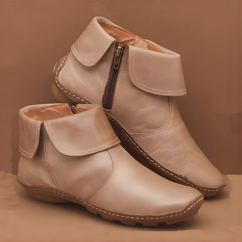 Ankle boots with foldover collars, side zips and flat soles