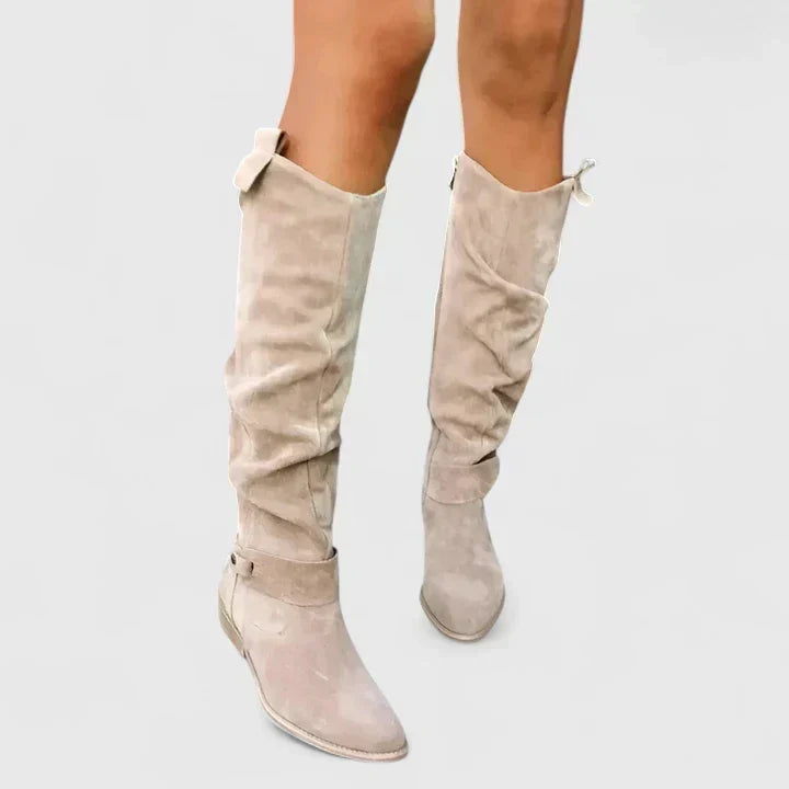 Women's slouch over-the-knee boots with low heels, side zips and strap detailing