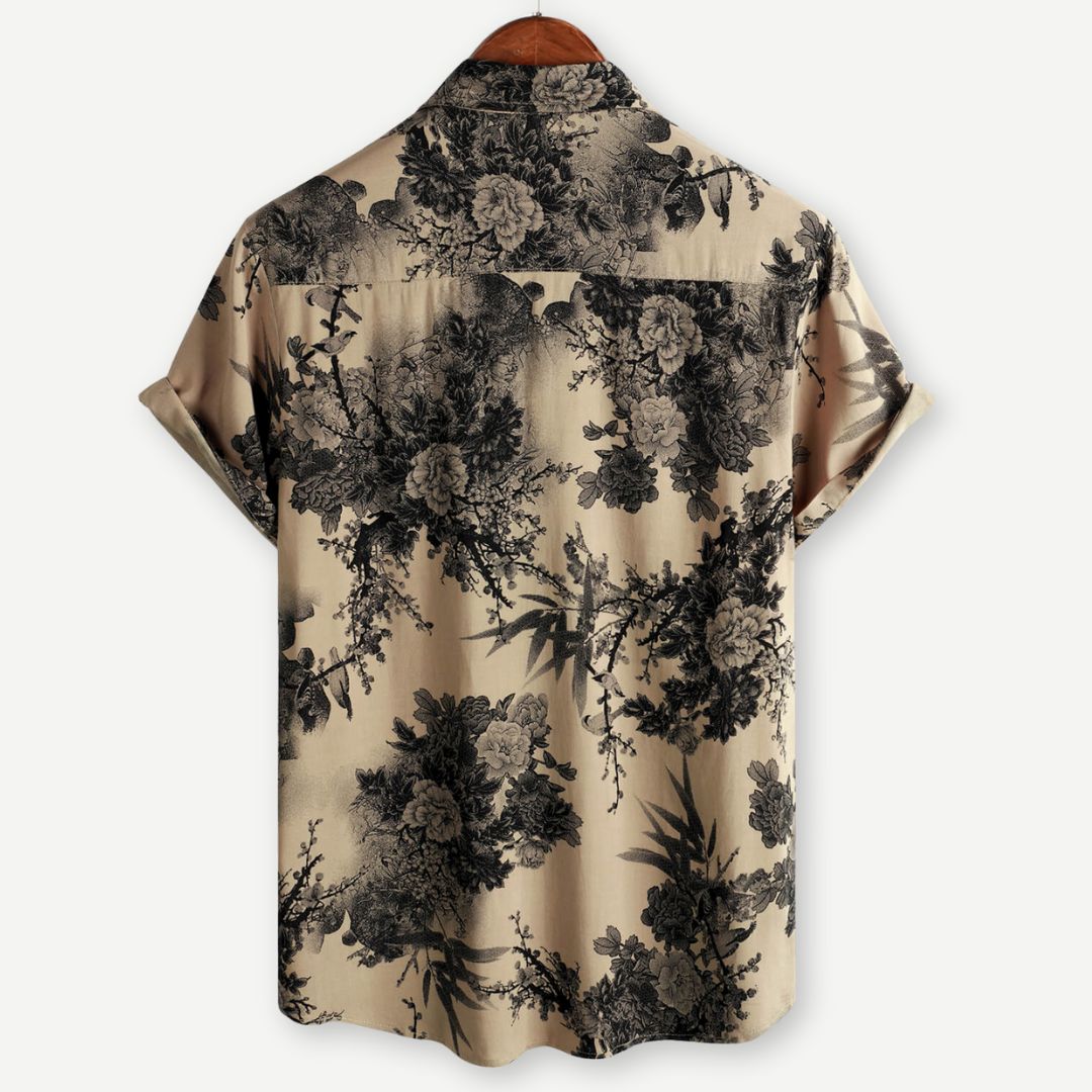 Men's beige short sleeve shirt with black floral print and button front
