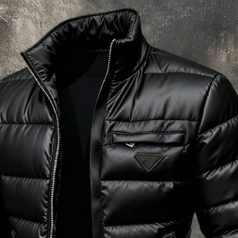 Men's black quilted puffer jacket with raised collar and front zip