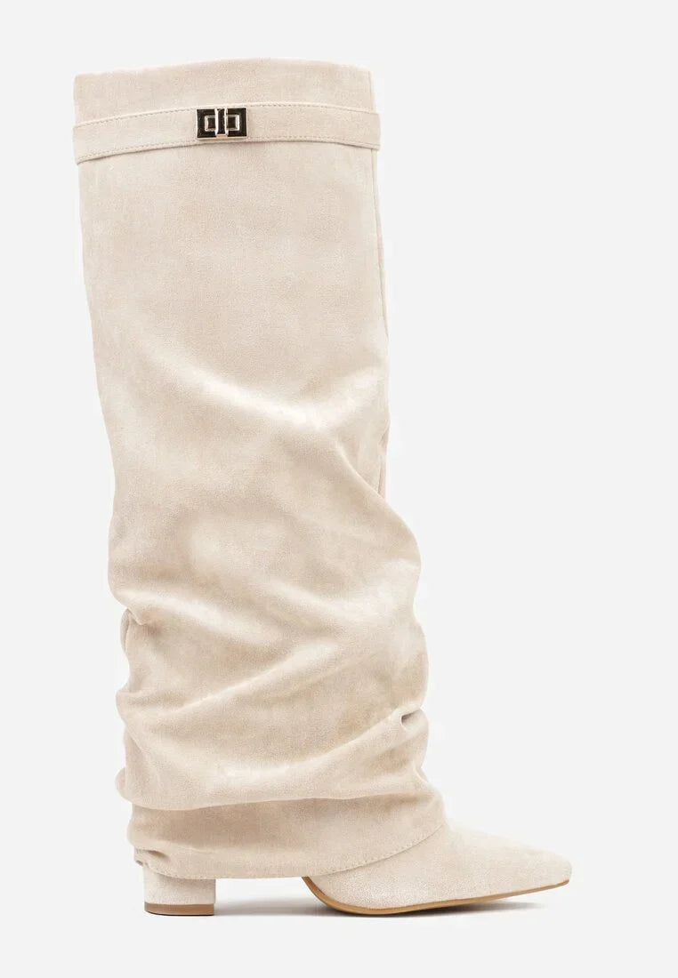 Women's slouch knee-high boots with pointed toes, low heels and buckle strap detail