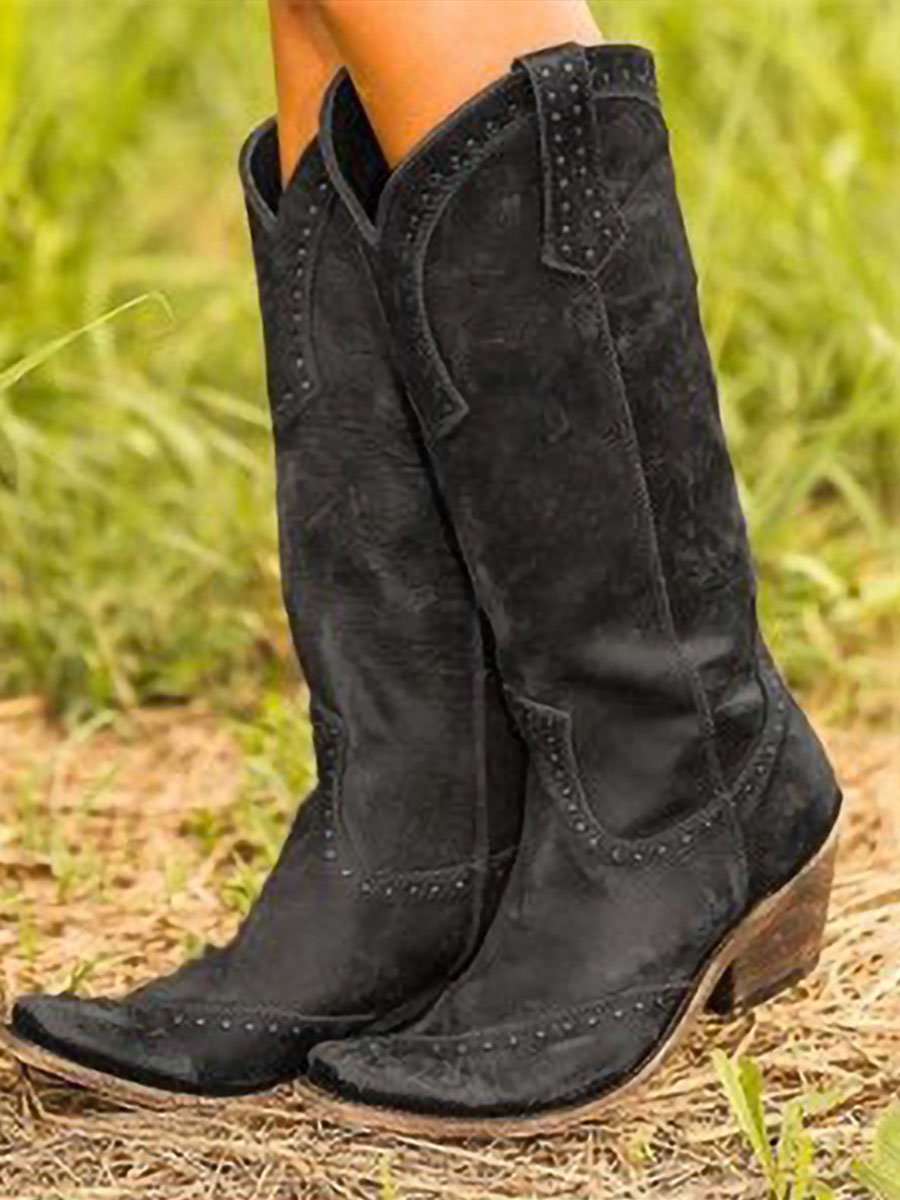 Women's studded cowboy boots with pointed toes, pull tabs and low heels