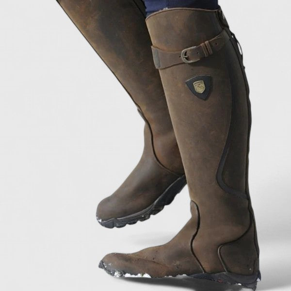 Women's knee-high panelled boots with buckle straps and low heels