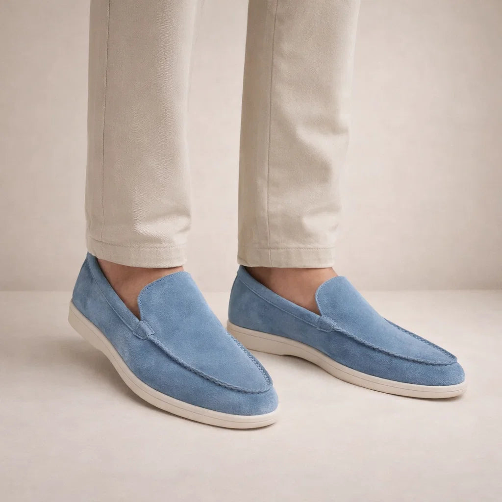 Men's slip-on moc toe loafers with stitched detail and flat light soles