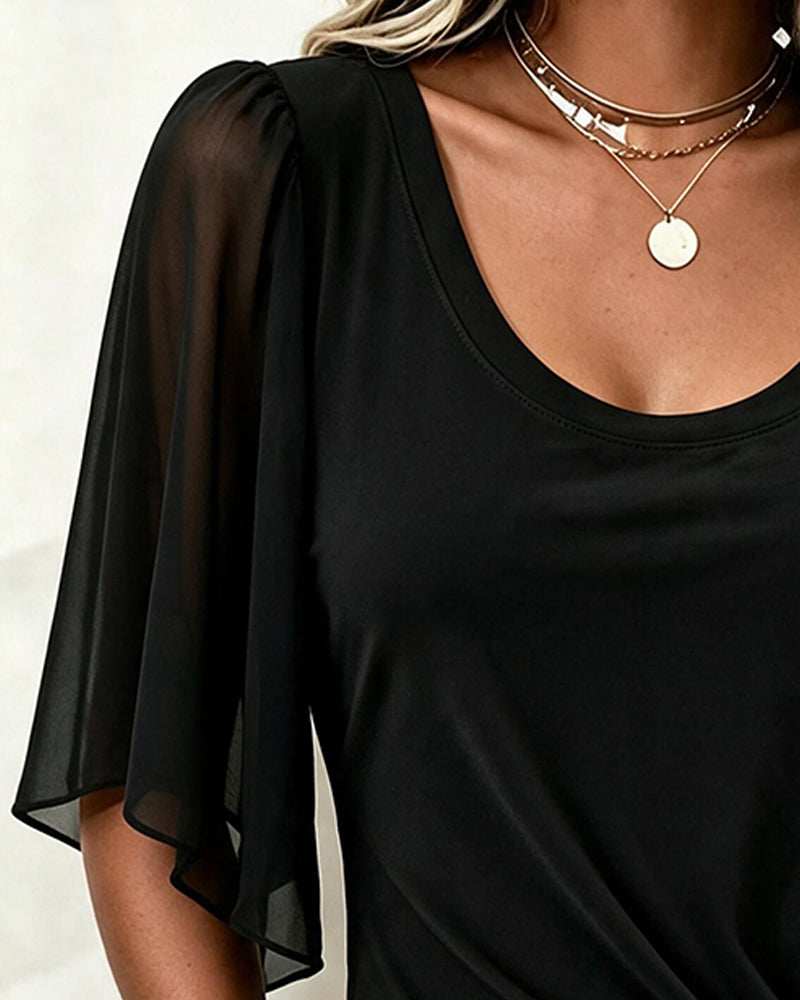 Women's black blouse with round neckline, sheer 3/4 sleeves and ruched ring waist detail