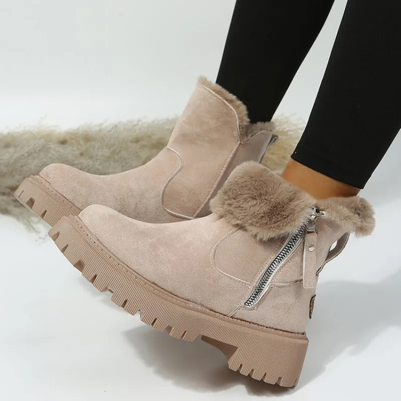 Women's ankle boots with plush fur cuffs, side zips and lugged soles